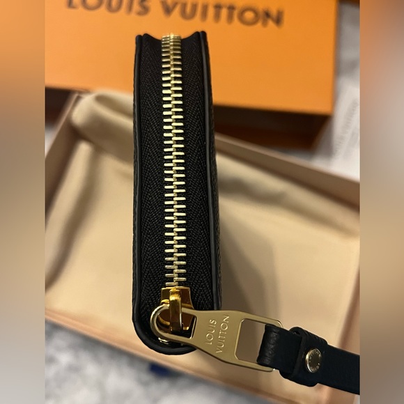 Louis Vuitton Monogram Empreinte Leather wallet for sale. - Picture 3 of 4